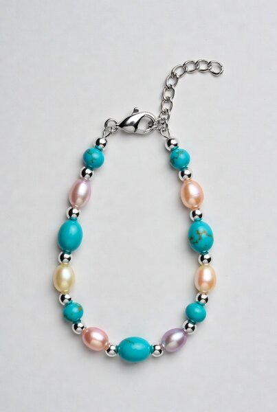 Turquoise and freshwater pearl bracelet with steel bead spacers